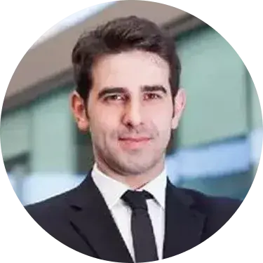 A smiling man with dark hair